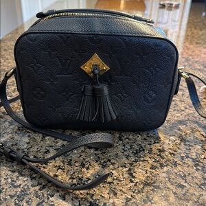 Discontinued Louis Vuitton Crossbody Bag. Excellent condition!